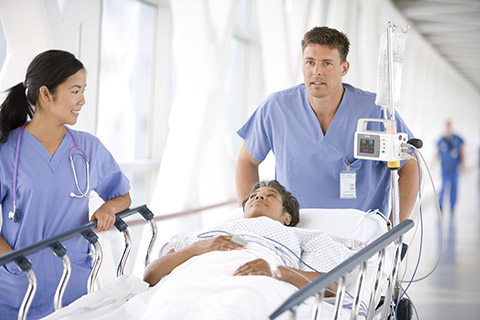 A patient is being wheeled in. Workflow adjustmenst can help in reducing the risk of HAI